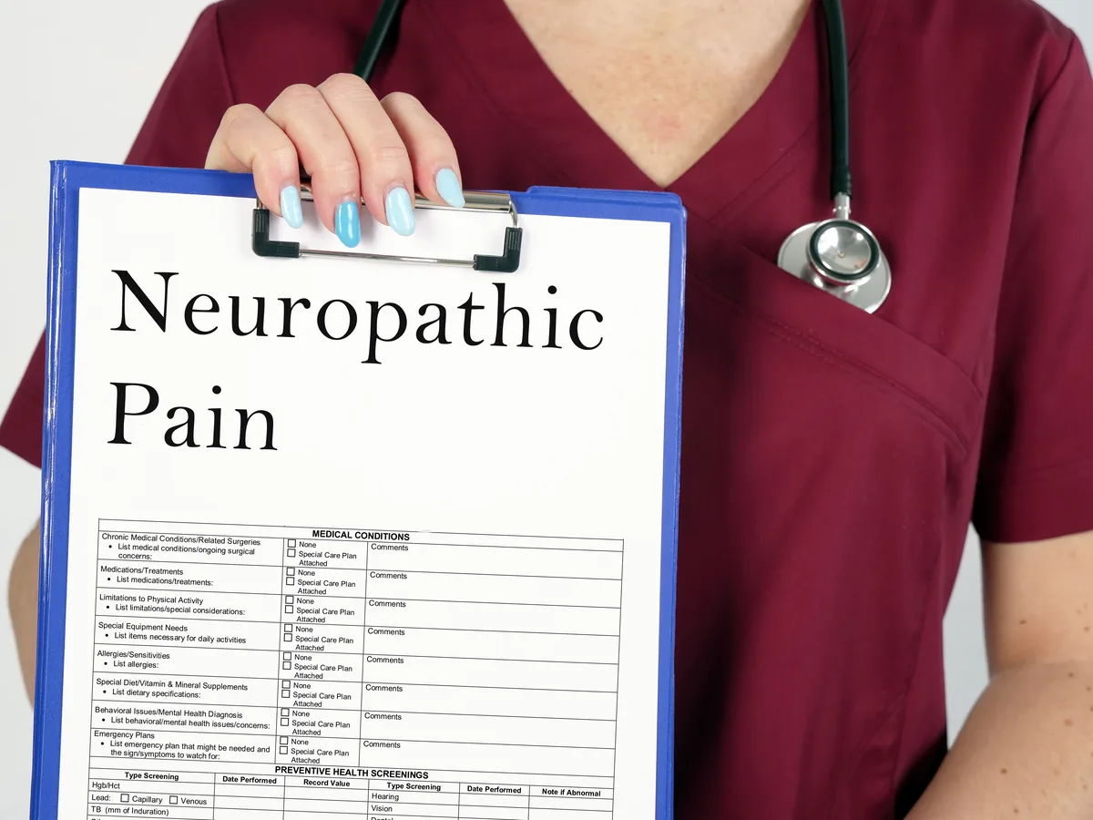 A clinician holding a neuropathic pain assessment at West Tennessee Neuropathy